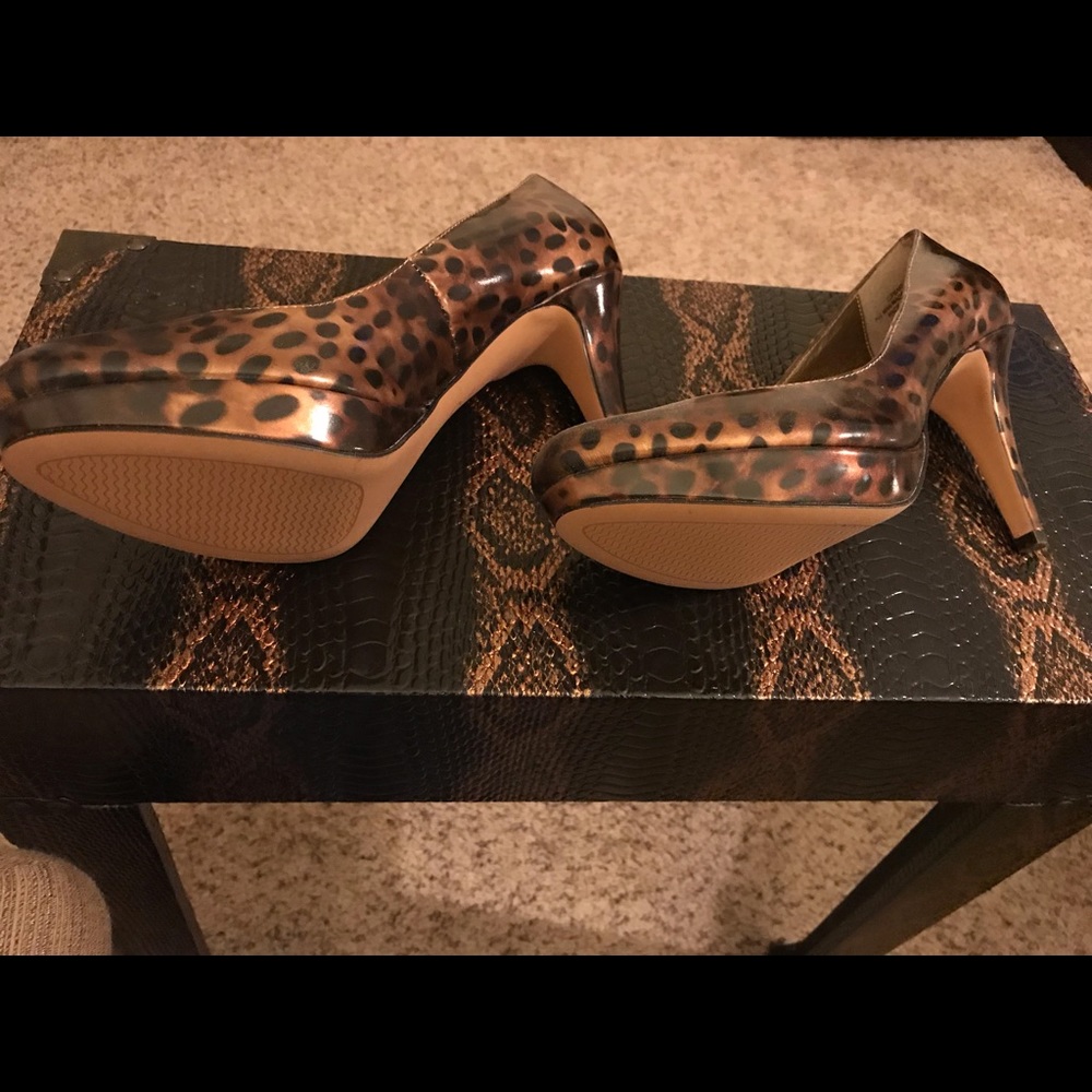 Joan and David Heels,small mark on heel.